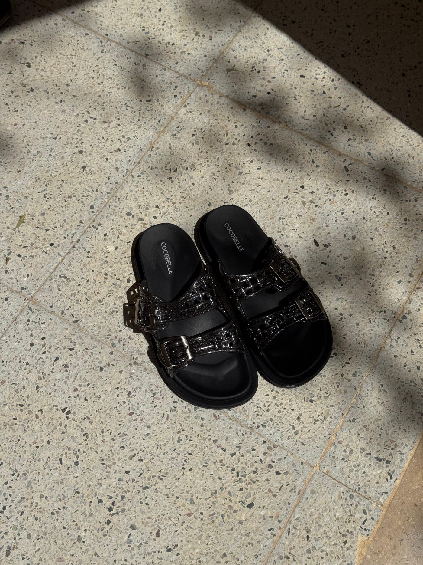 Isabel Jelly caged slides in black