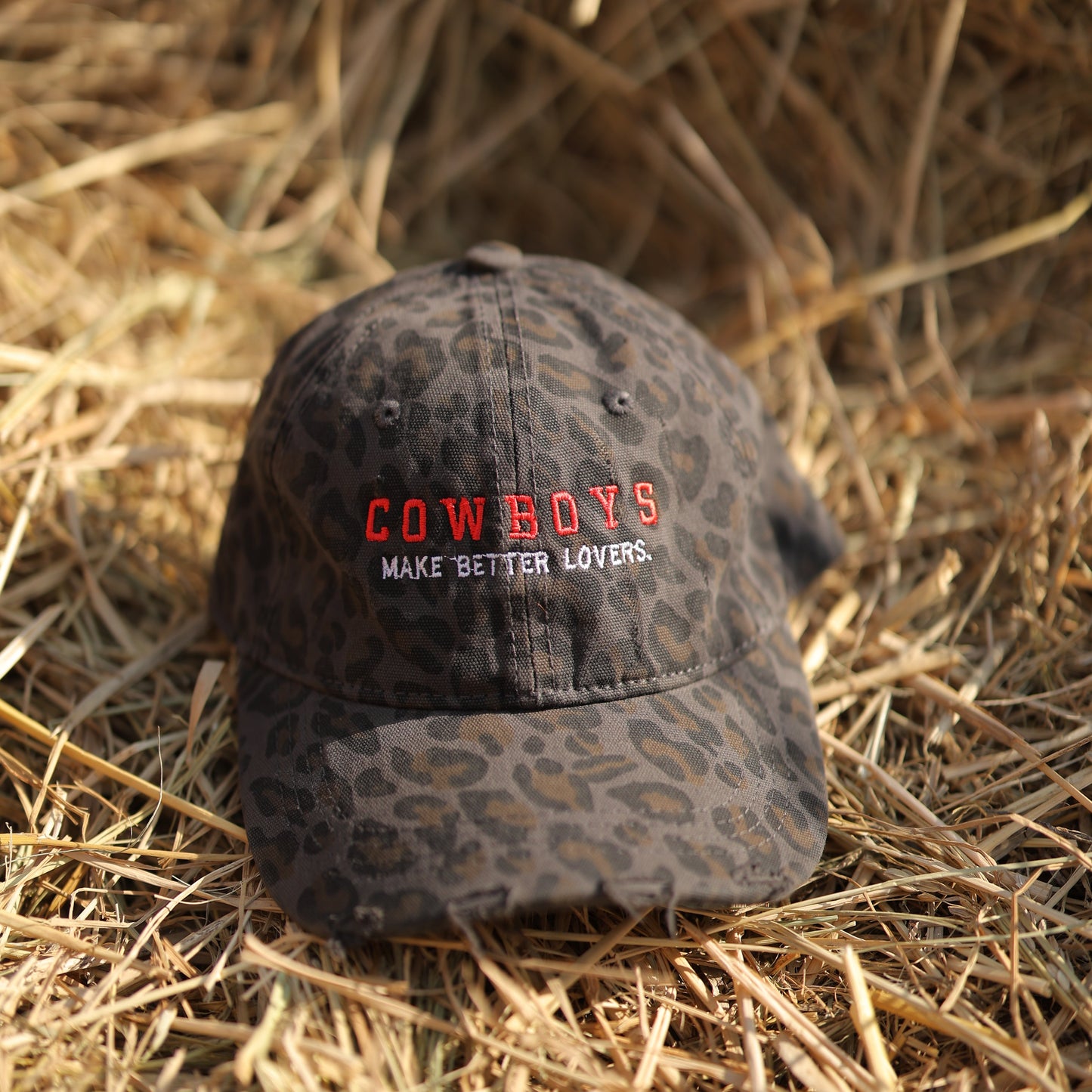 “Cowboys Make Better Lovers” Cap in Black Leopard