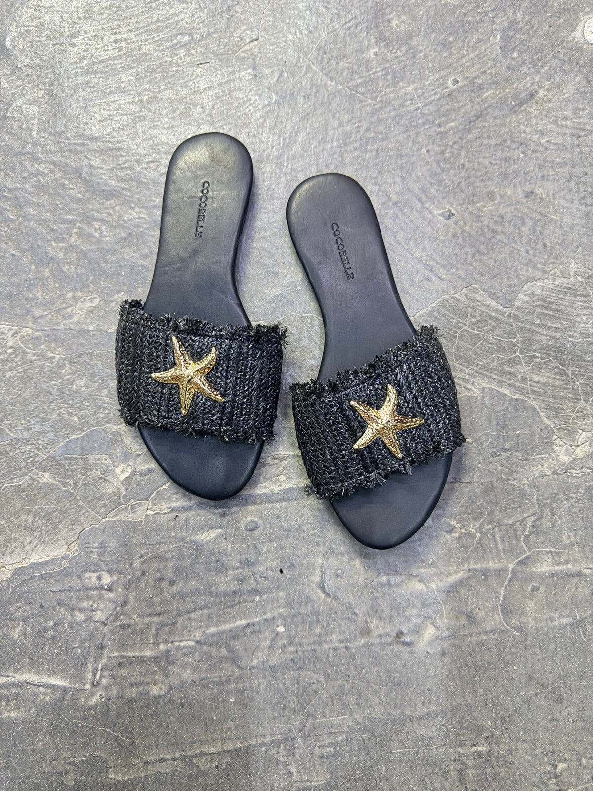 Iris in Black Raffia with starfish