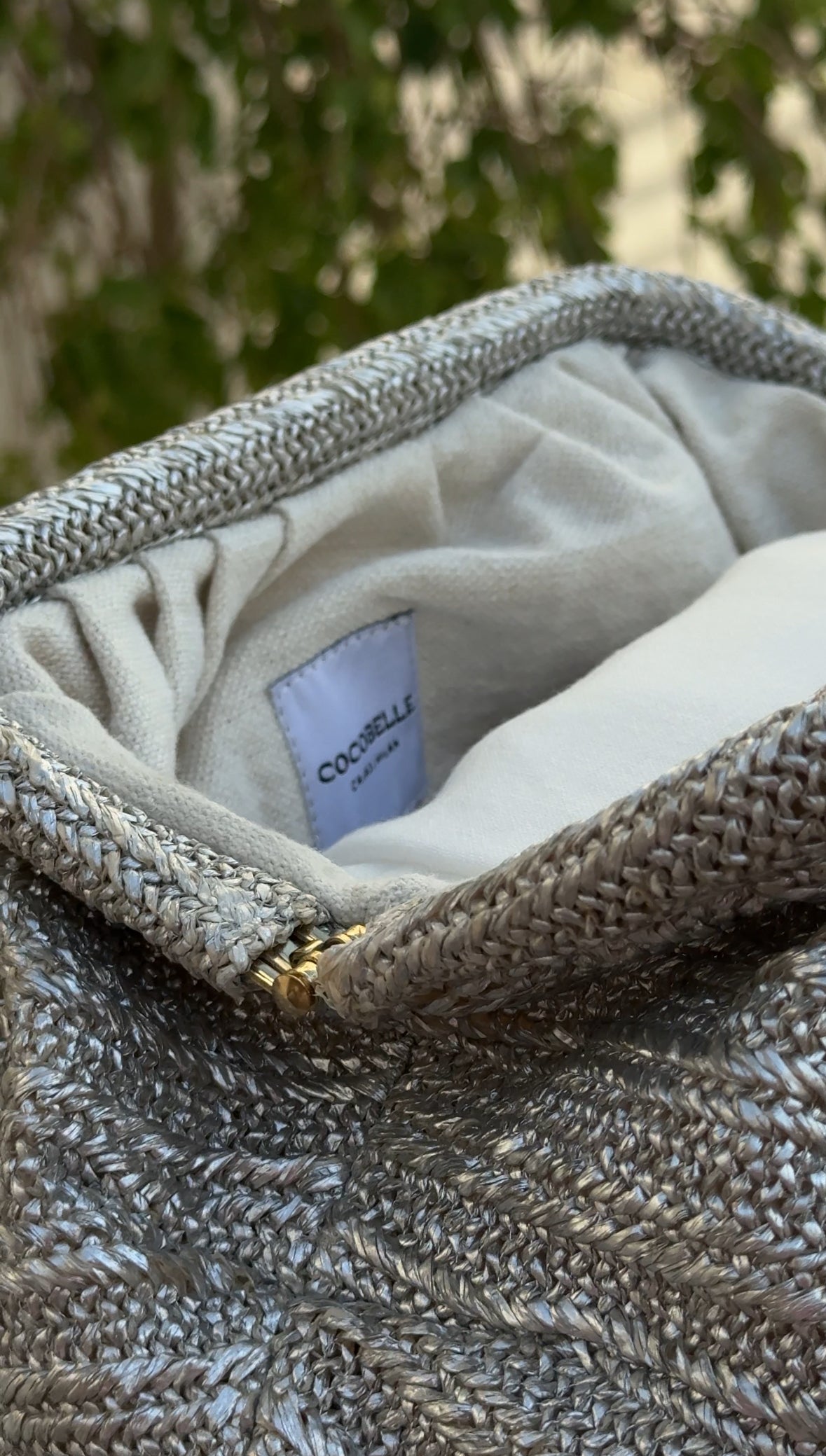 The Maya Clutch in Silver Raffia