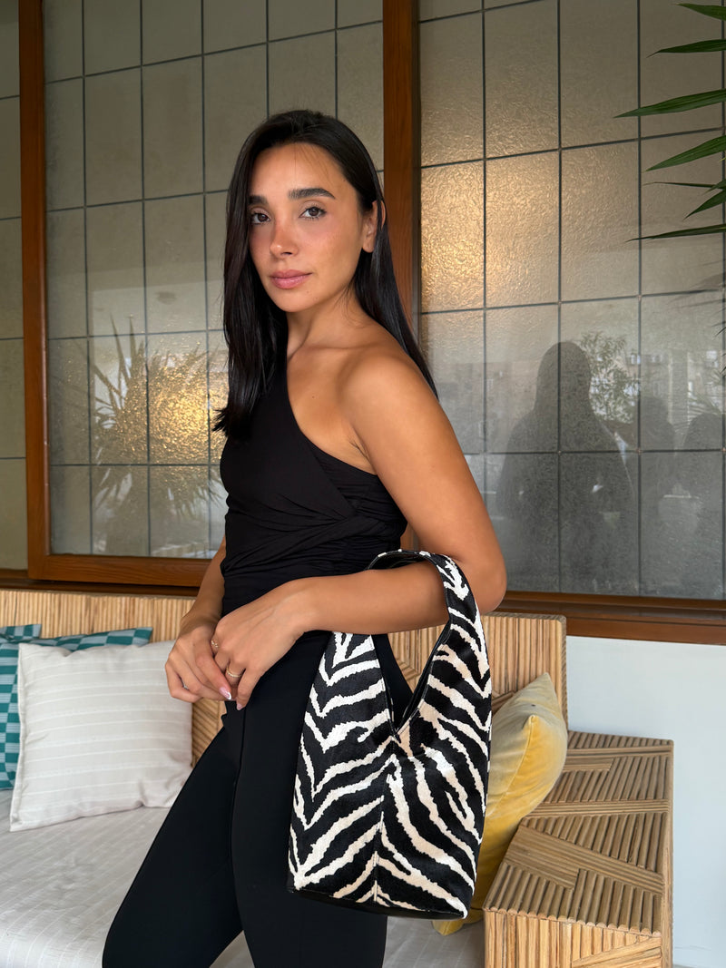 The Demure mini bag in Wild Zebra
