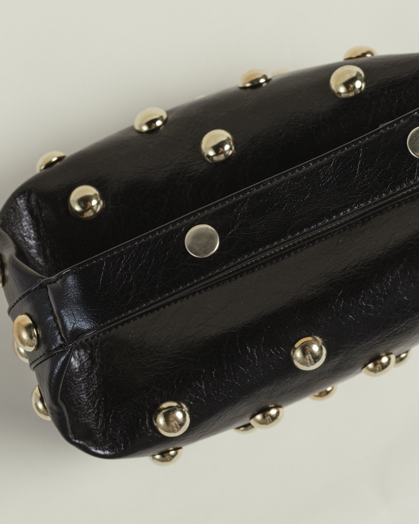 Bric in Black & Silver Eyelets