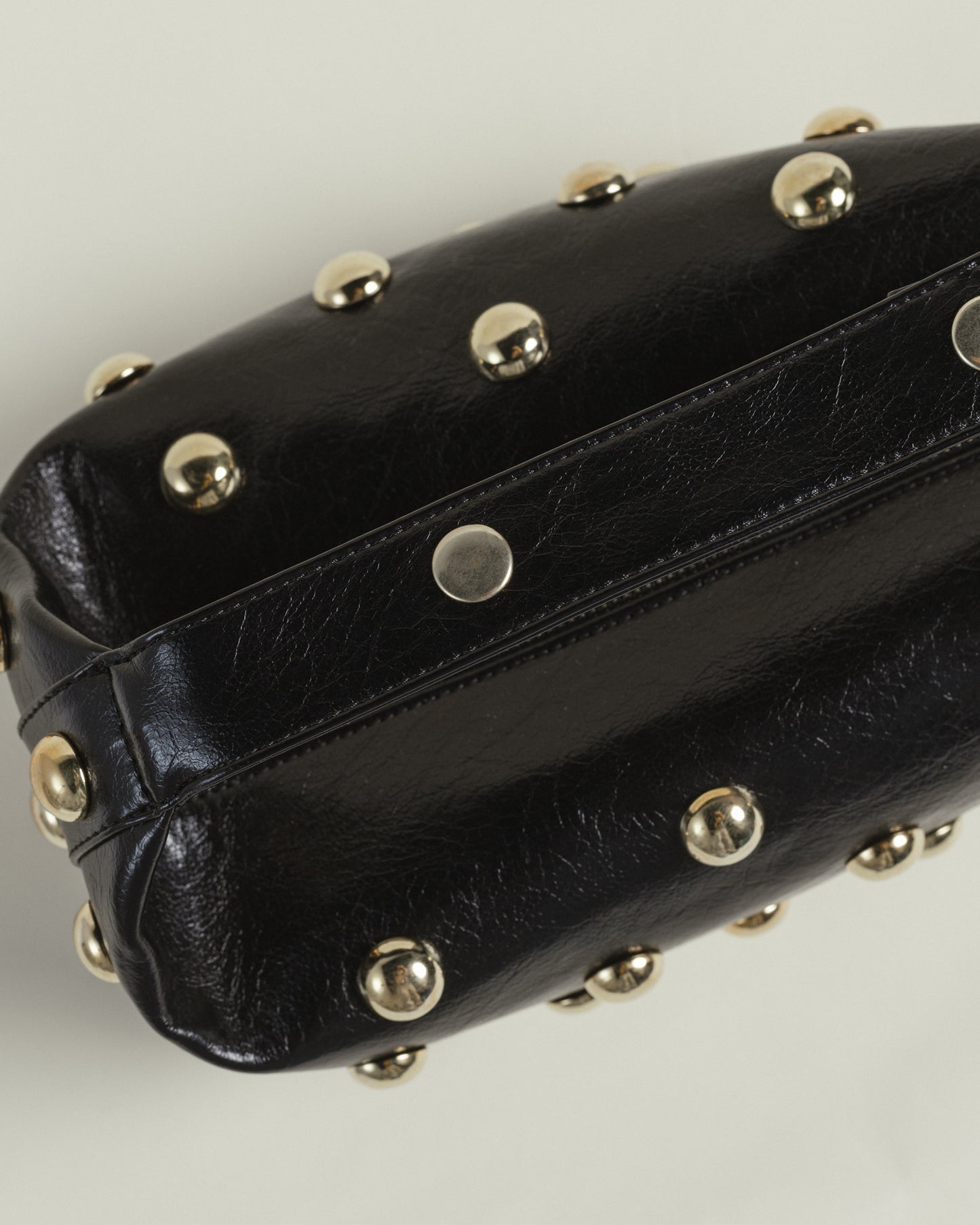 Bric in Black & Silver Eyelets