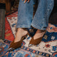Iconic Metal-Cap Mules in Brown