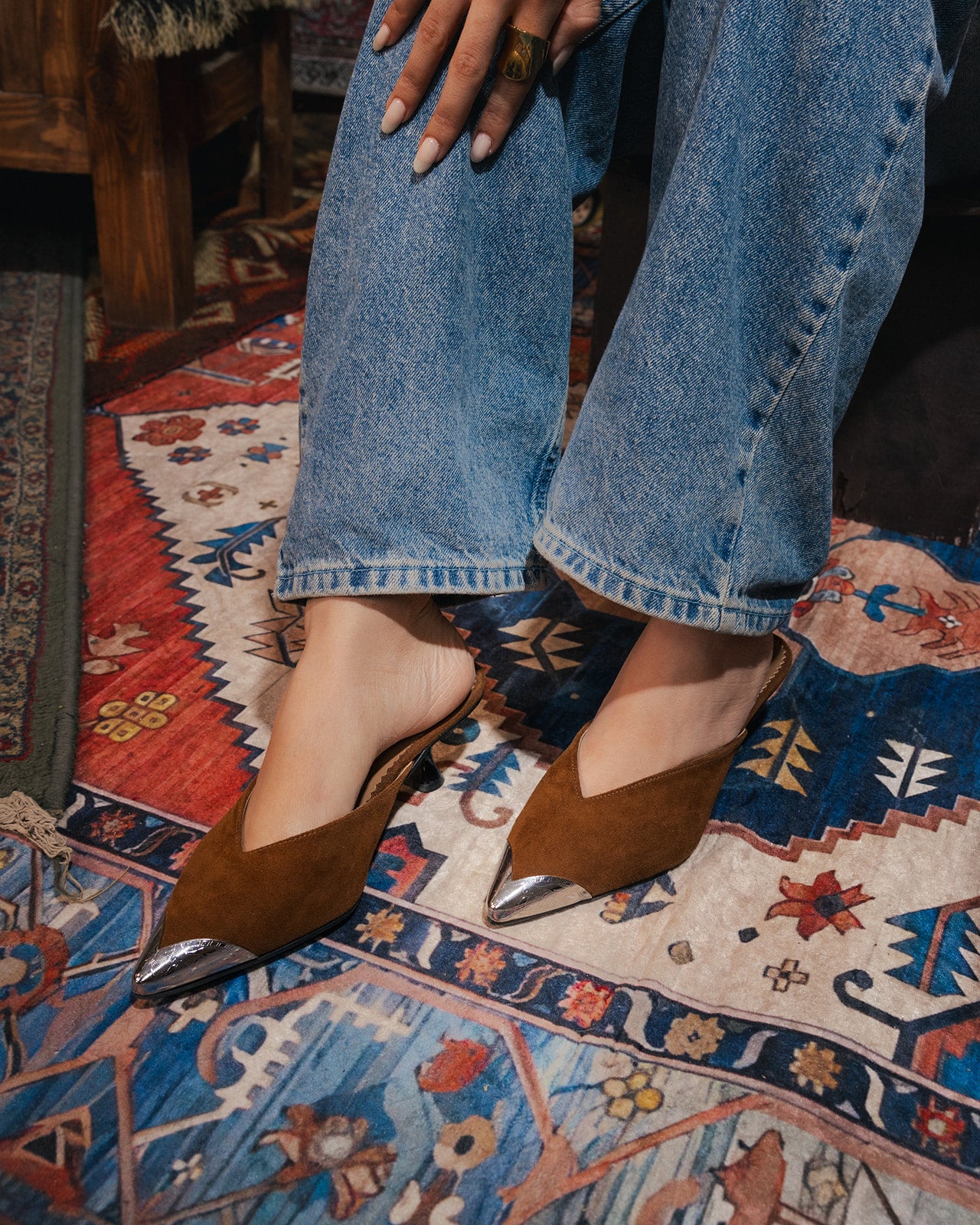 Iconic Metal-Cap Mules in Brown