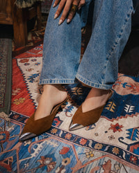Iconic Metal-Cap Mules in Brown