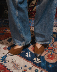 Iconic Metal-Cap Mules in Brown