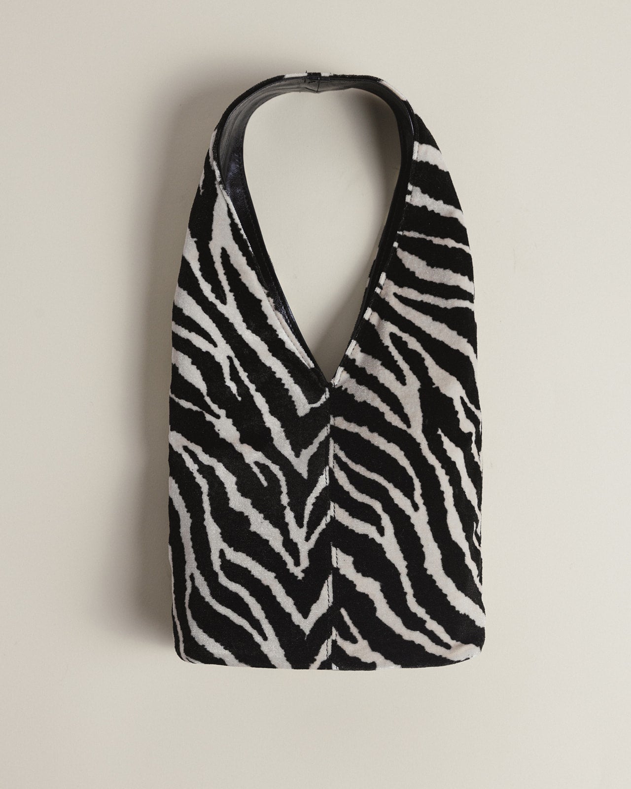 The Demure mini bag in Wild Zebra