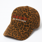 “ Cowboys Make Better Lovers” Cap in Brown Leopard