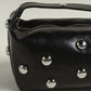 Bric in Black & Silver Eyelets