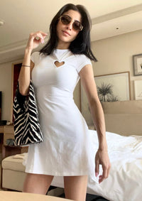 The Demure mini bag in Wild Zebra
