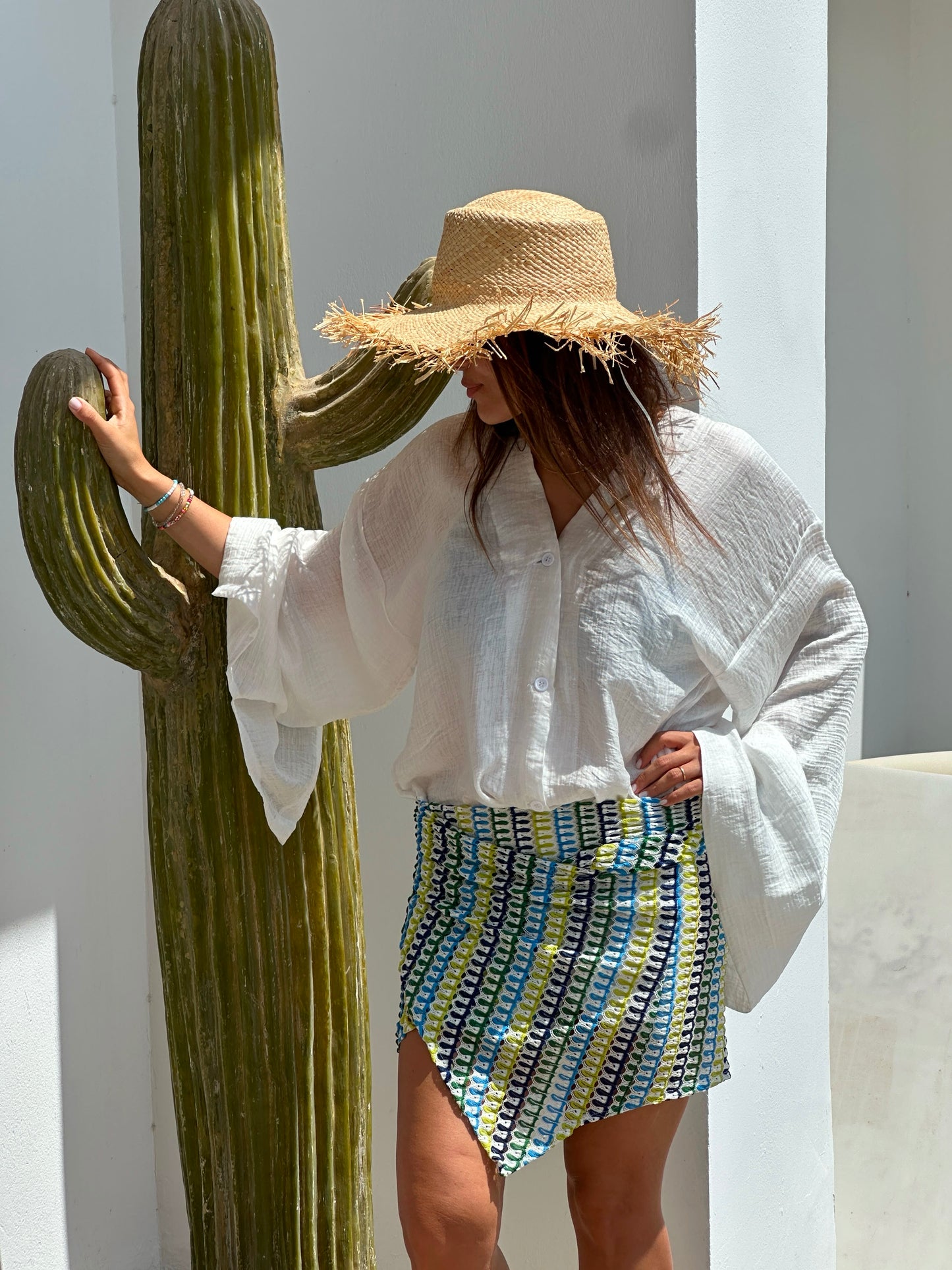 Soraya in white-shirt & green wrap