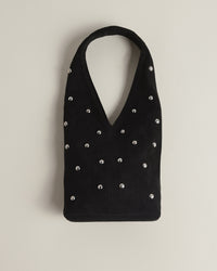 The Demure mini bag in Black + Silver Eyelets