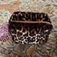 The Lola Velvet Toiletry Pouch in Leopard