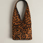 The Demure mini bag in So Leopard!