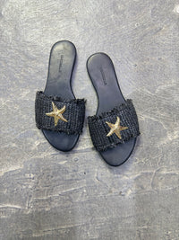 Iris in Black Raffia with starfish