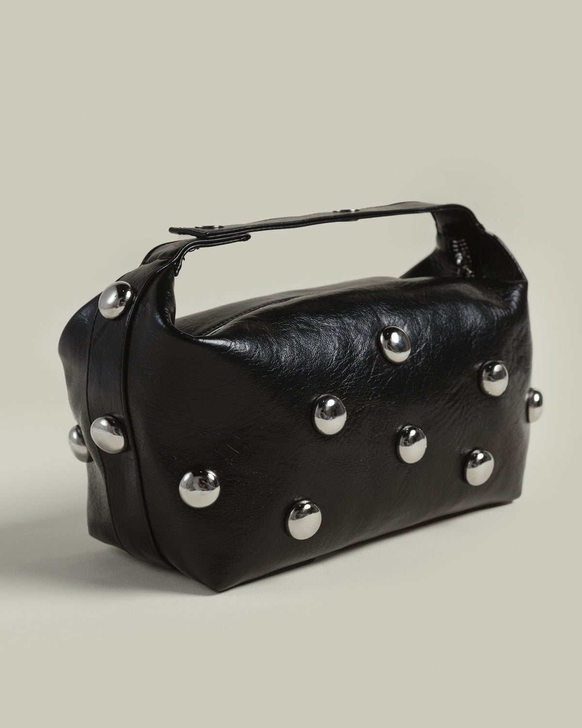 Bric top handle bag in black with silver eyelets by COCOBELLE, view 2