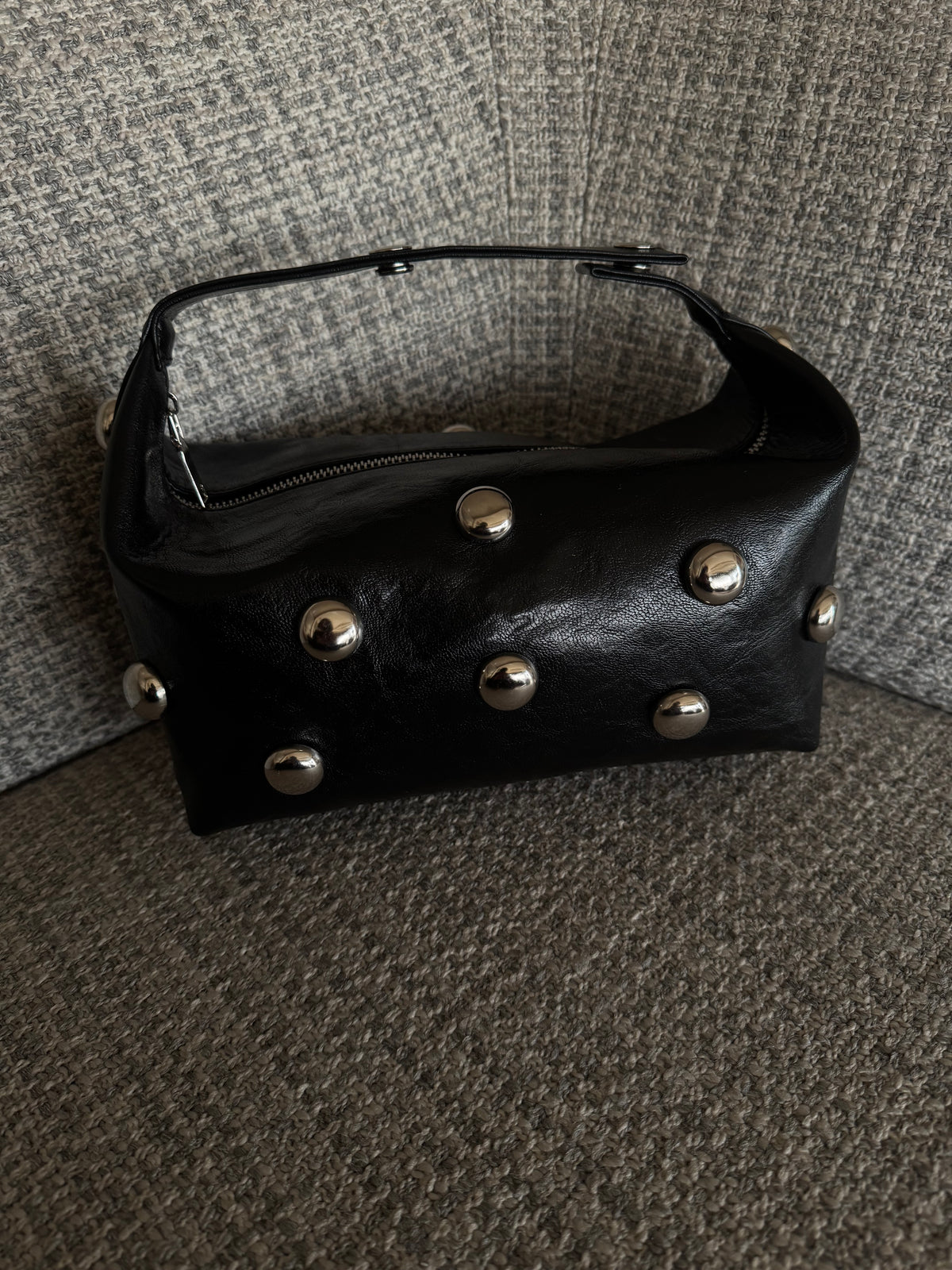 Bric top handle bag in black with silver eyelets by COCOBELLE, view 4