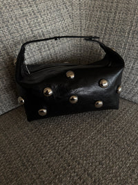 Bric top handle bag in black with silver eyelets by COCOBELLE, view 4