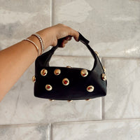 Bric top handle bag in black with silver eyelets by COCOBELLE, view 6