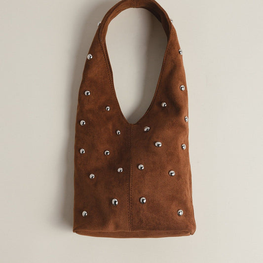 Demure mini bag in brown suede with silver eyelets by COCOBELLE