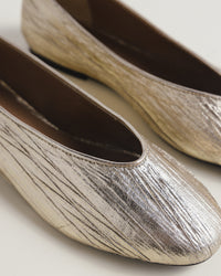 Jackie-O metallic gold ballerina flats by COCOBELLE
