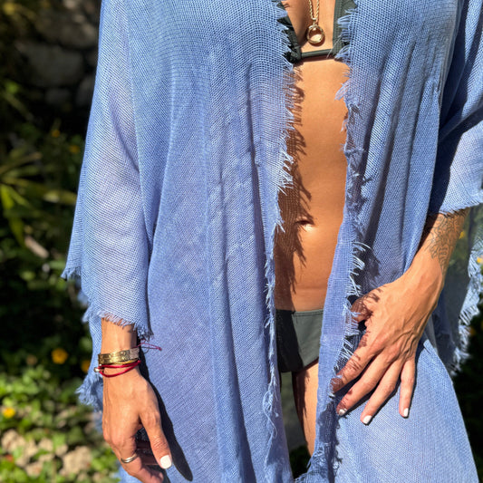Tulum handwoven fringe cover-up in blue by COCOBELLE