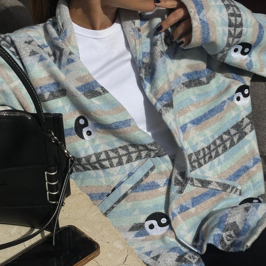 Ying-Yang embroidered blanket cardigan in blue by COCOBELLE