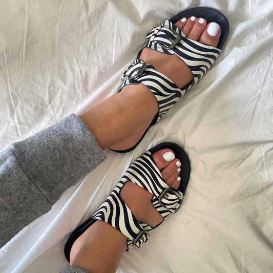 Isabel Slides in Wild Zebra